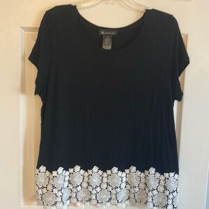 Black top with crochet bottom/trim size L